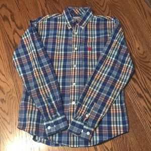 Cinch colorful button up to wear in the arena